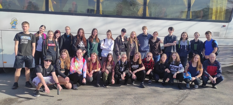 Student v lese